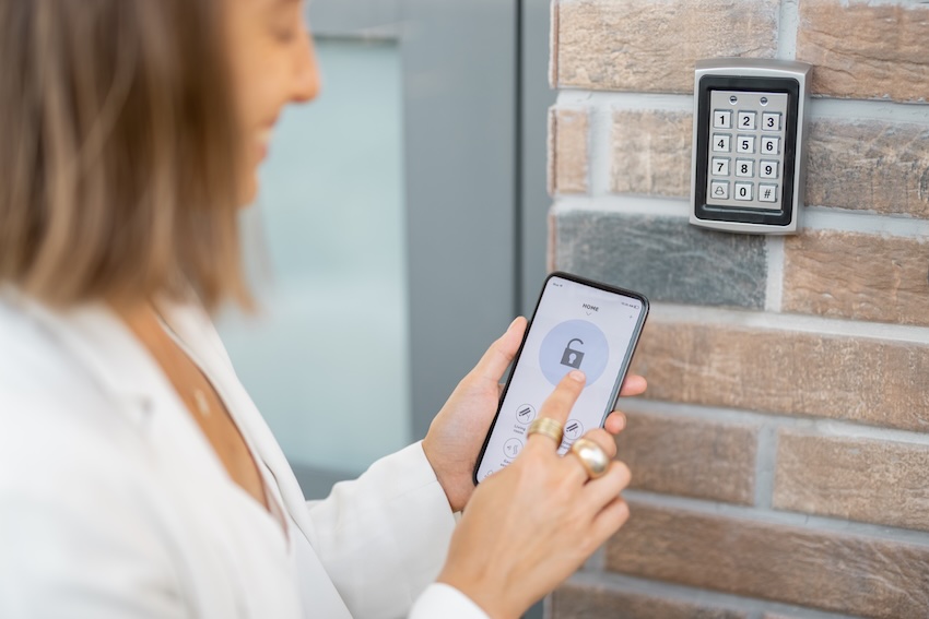 Woman scanning fingerprint with futuristic interface smart technology AI security Cote Azur