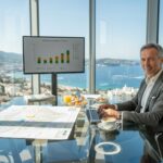 Investor viewing luxury property listings Côte d'Azur