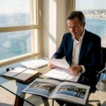 Private banker reviews luxury property documents