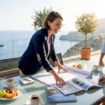 Advisor reviews real estate plans near sea