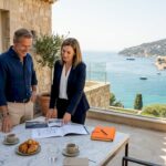 Client and agent reviewing luxury Riviera property