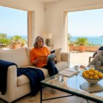 Couple reading in sunny Côte d'Azur villa