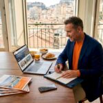 Investor reviewing international luxury property listings