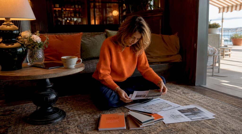 Interior designer reviewing home layout plans
