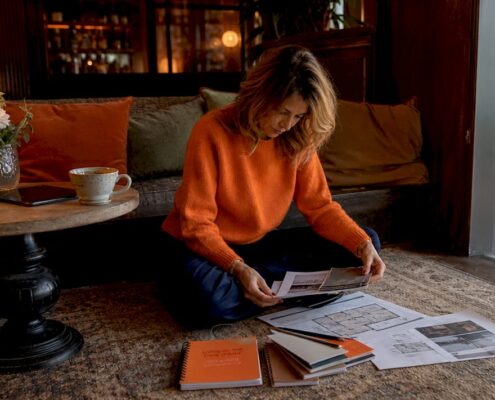 Interior designer reviewing home layout plans