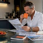 Man reviewing Paris property investment papers