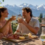 Couple enjoying drinks on sunny beach terrace