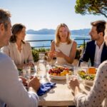 Couple interviewing buyer agents on Riviera terrace