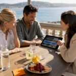 Couple and buyer agent reviewing Riviera properties